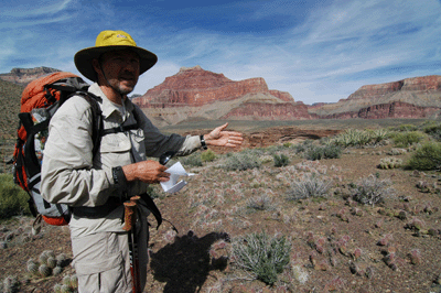 Taking a break while hiking along the west rim of Trinity Creek Canyon